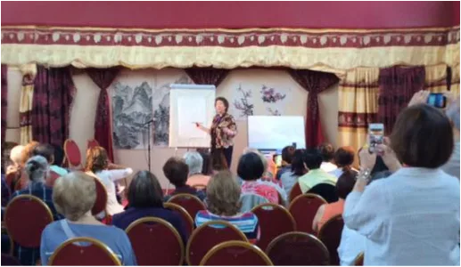 Picture of Virginia demonstrating in London, England to a capacity crowd