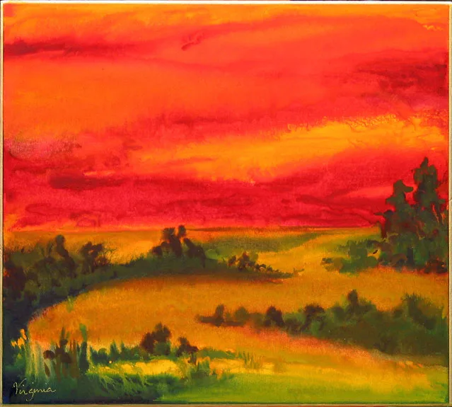 Winding river at sunset in red, orange, yellow and green