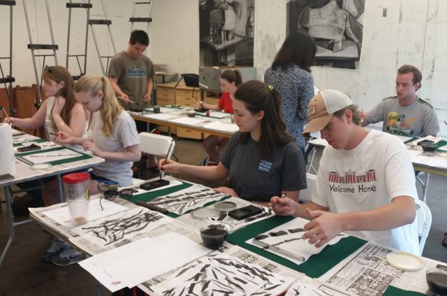 Picture Washington & Lee students learning how to paint bamboo