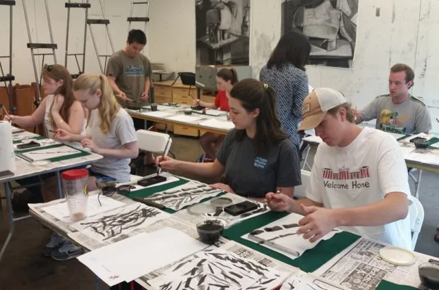 Picture Washington & Lee students learning how to paint bamboo