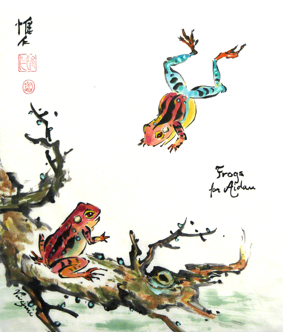 Multi-color frogs, one sitting, one leaping Picture