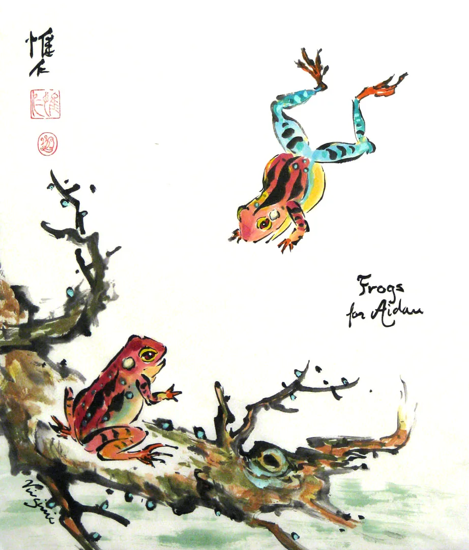 Multi-color frogs, one sitting, one leaping Picture