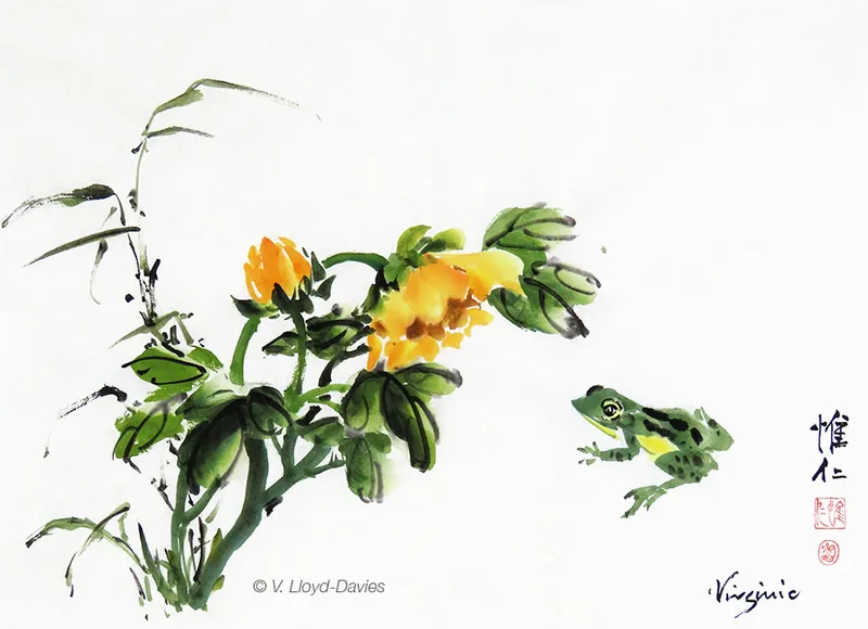 green frog and yellow sunflower