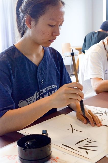 Picture Japanese student with brush