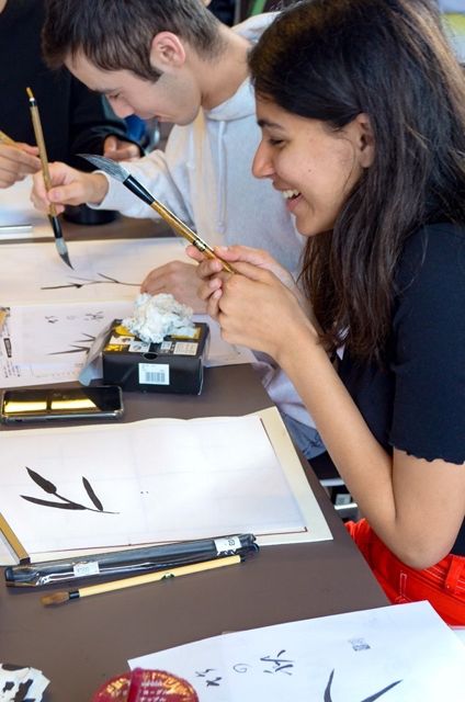 Picture of 2 students laughing
