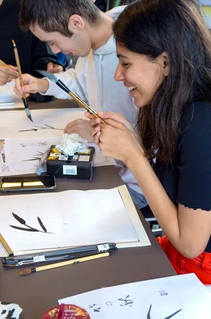 Picture of 2 students laughing