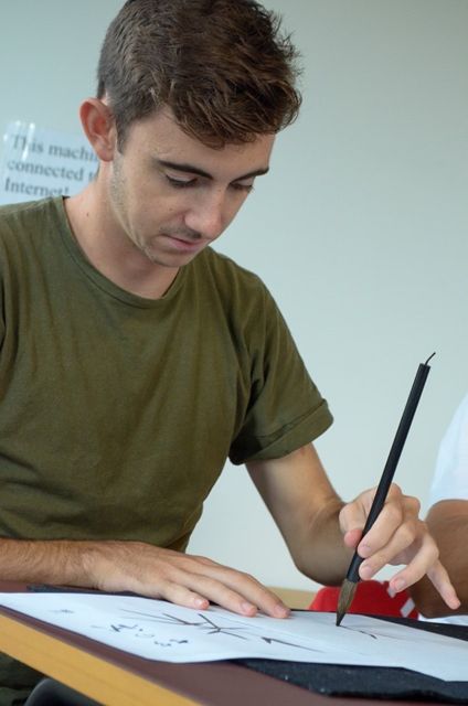Picture Western student with brush