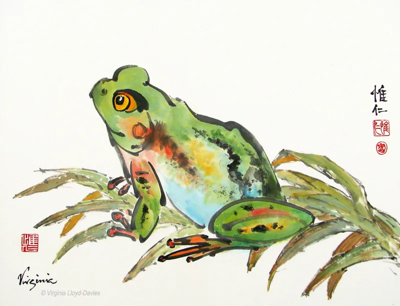 green frog sitting on frond